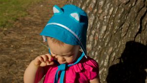 Baby Wearing Bonnet