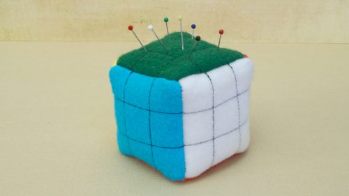 Puzzle Cube PIncushion With Cream Background