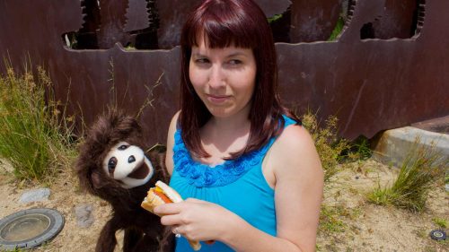 Stanley The Sloth Puppet And Professor Pincushion Eating A Hotdog